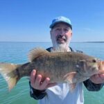 2023 Schultz Sportfishing Photo of Captain Barry with a 6# Smallie