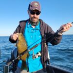 2024 Schultz Sportfishing Picture of a Smallie caught on a custom Ghost Rod's Dropshot Rod